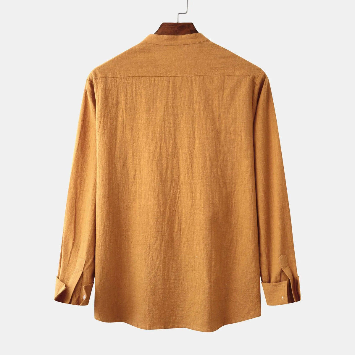 Men's slim fit brown long sleeve shirt and matching casual trousers on a hanger.