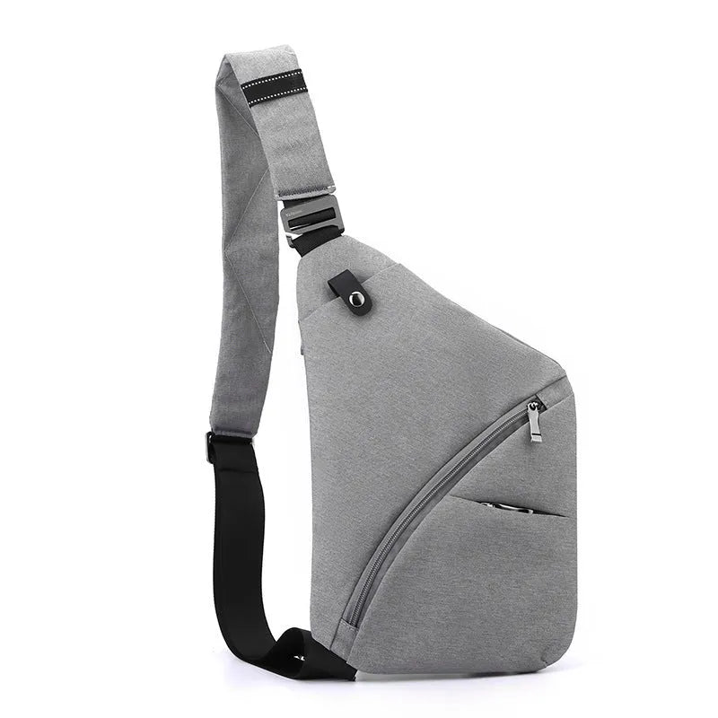 Men's oxford cloth chest bag in black or grey with left or right shoulder carrying options