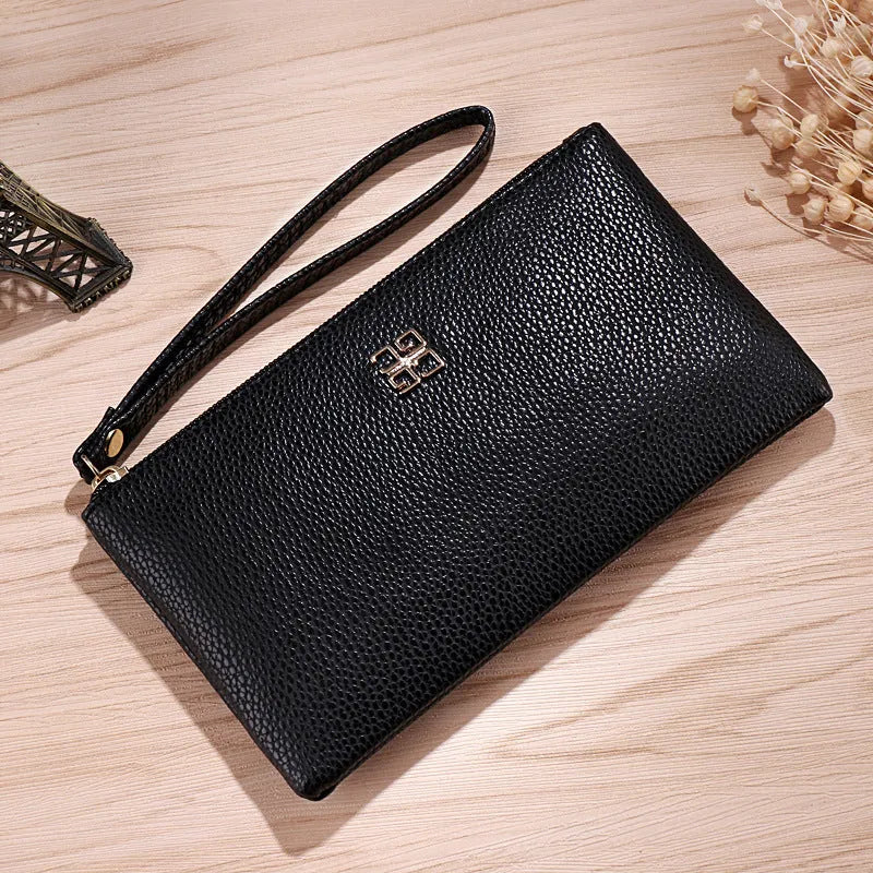 Long 55-inch PU leather phone wallet handbag with zip closure in a solid colour