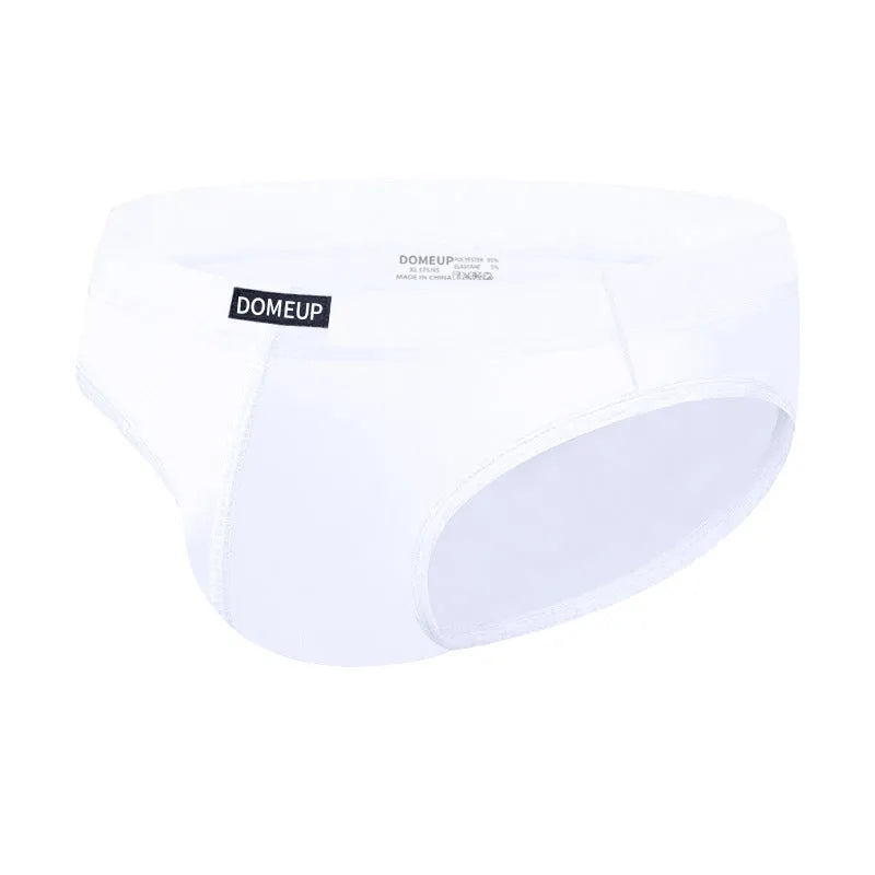 Men's solid colour low-waist seamless briefs in white, black, and pink on a size chart