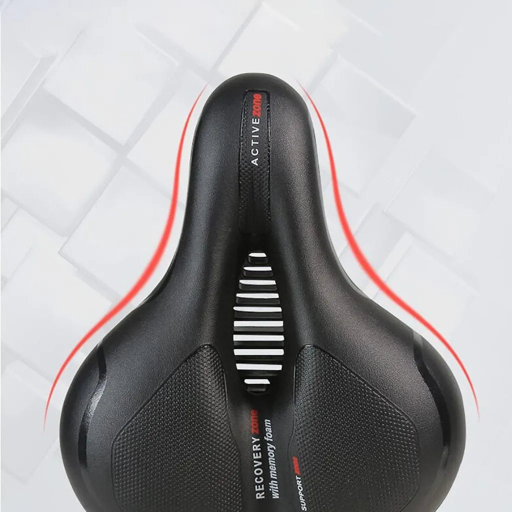 Hollow seat cushion bicycle saddle with PU leather cover, memory foam pad, and PP base, 26x21cm, in blue, red, or yellow.