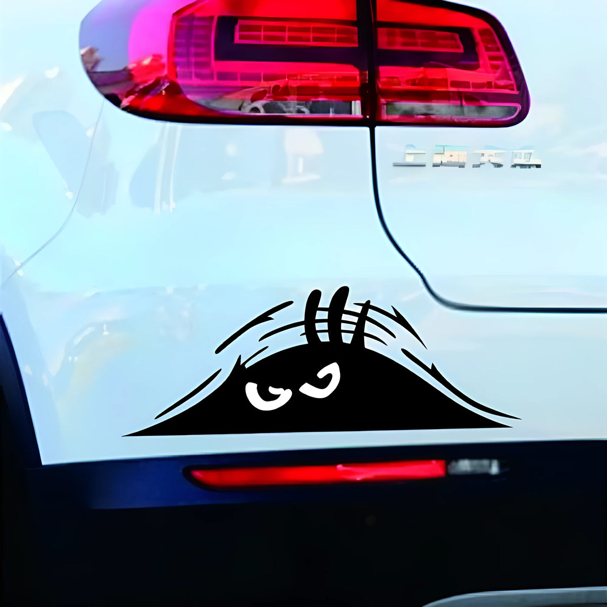 Four self adhesive body sticker designs: colourful smiley, black smiley, white smiley, and black angry face on a 19x7cm sheet.