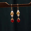 A pair of geometric-shaped alloy earrings with an electroplated finish in a vintage Han Cheongsam court style.