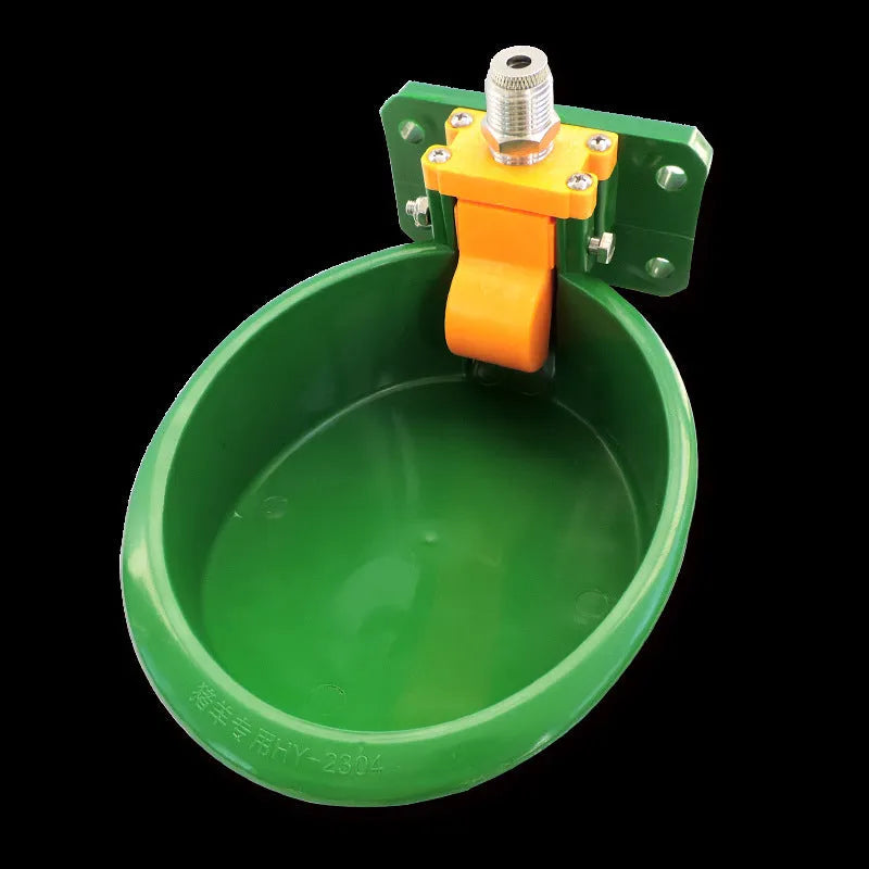 Green plastic drinking bowl for sheep livestock on farms