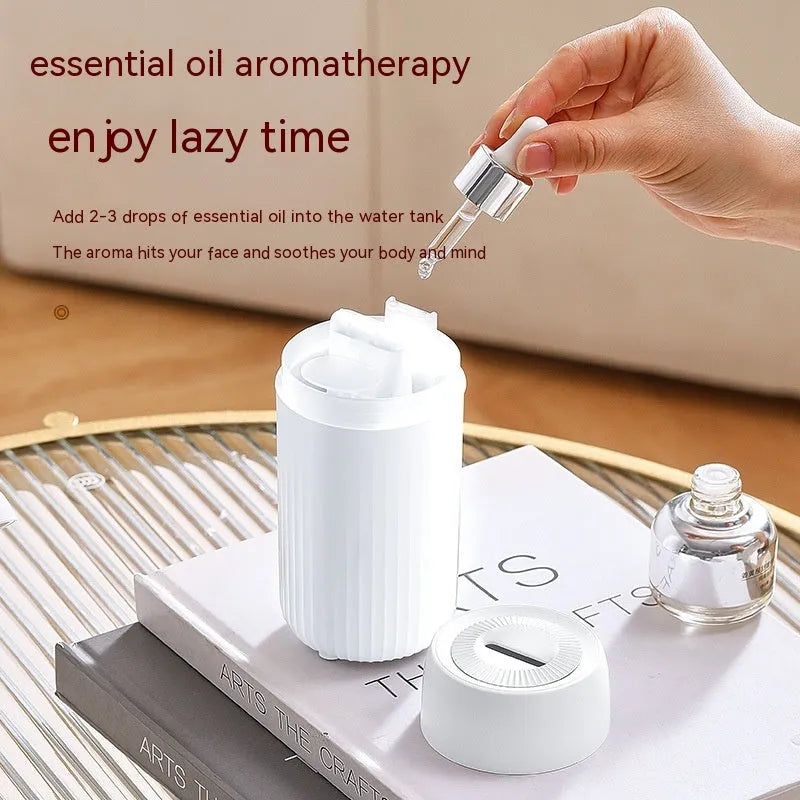 Car simulation flame aroma diffuser with USB cable, measuring 70x70x143mm in black or white plastic