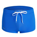 Men's solid colour low waist nylon swimming trunks with lace detail.