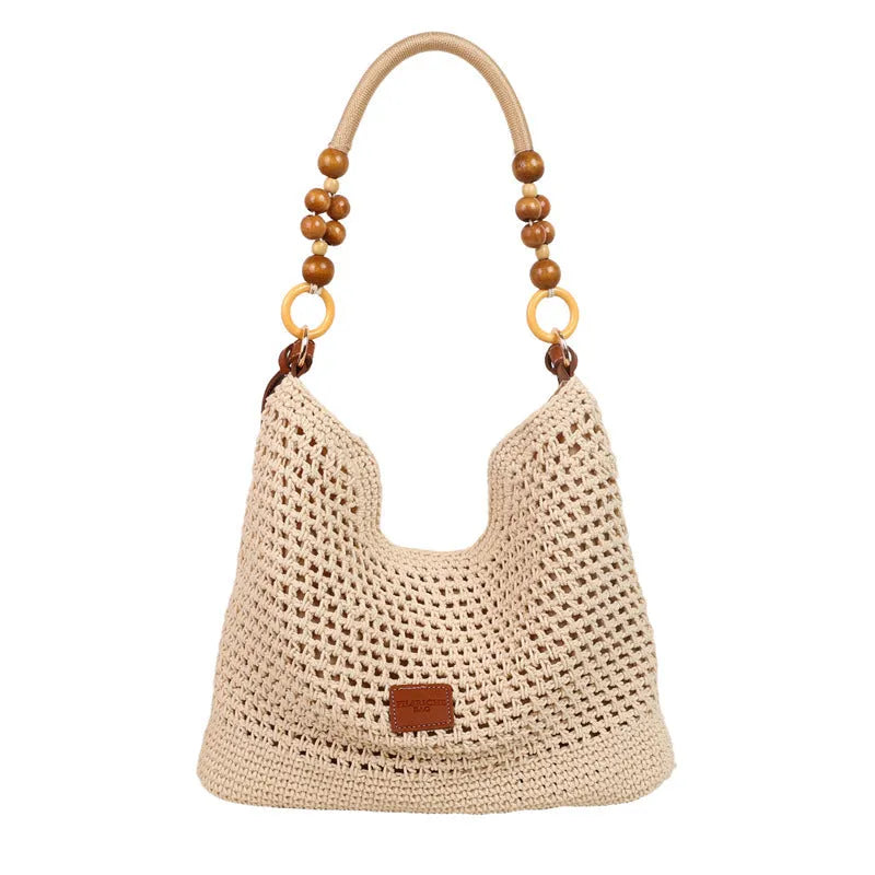 Knitted tote beach bag with bucket shape and contrast stitching in black or brown colour