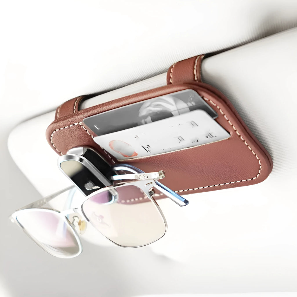 Cowhide leather car sunglasses holder with card slots, shown in colour options, attached to a vehicle sun louver.