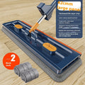 Large blue flat mop with long stainless steel handle and 360-degree rotating head on a hard floor