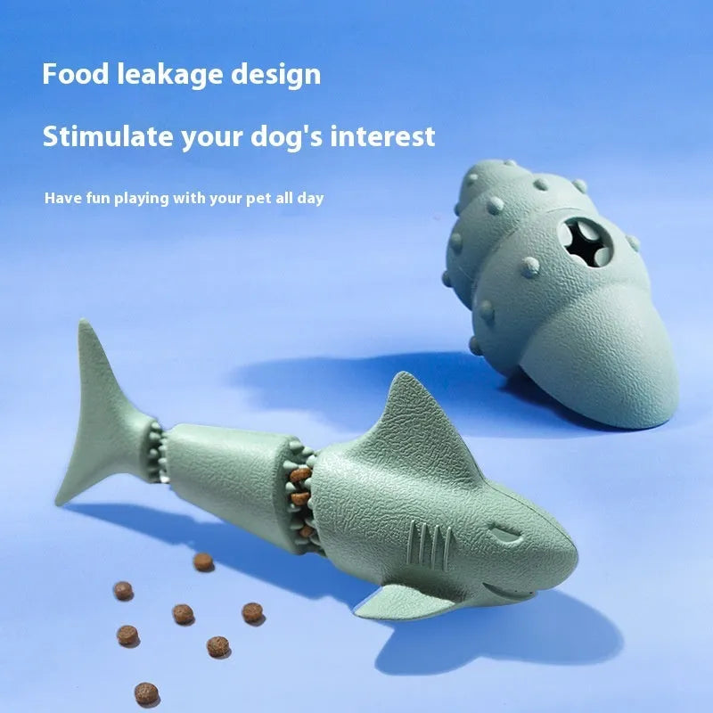 Blue deep sea shark-shaped rubber dog chew toy on a white background.