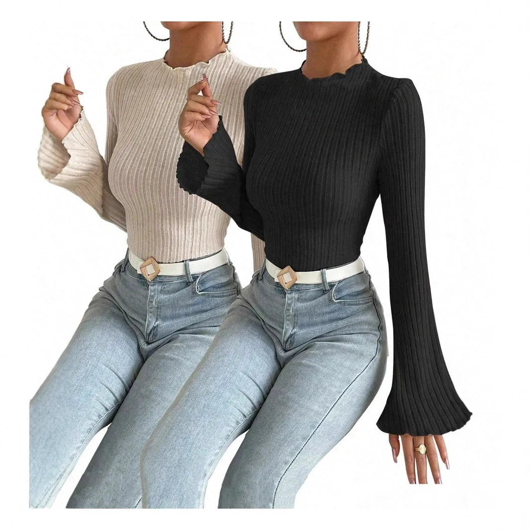 Long sleeve round neck top in black with lantern sleeves and brushed sunken stripe texture