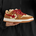 Women's brown platform sneakers with sequin accents and round toe design