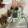 Minority denim skateboard shoes in black, green, and pink colours with rubber sole and lace-up front.