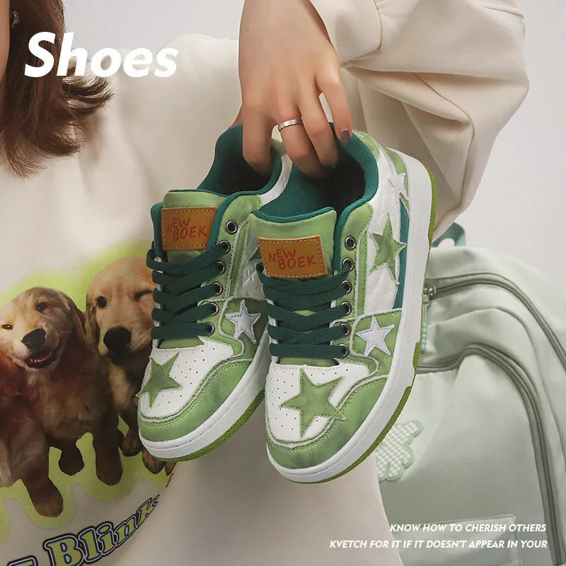 Minority denim skateboard shoes in black, green, and pink colours with rubber sole and lace-up front.
