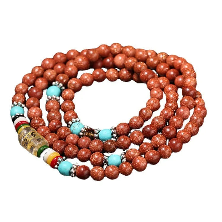 Golden star stone mantra bracelet with 108 sand beads and fu character ornament