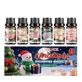 Christmas aromatherapy oil set showing six 60ml bottles with reed diffusers for festive home scent