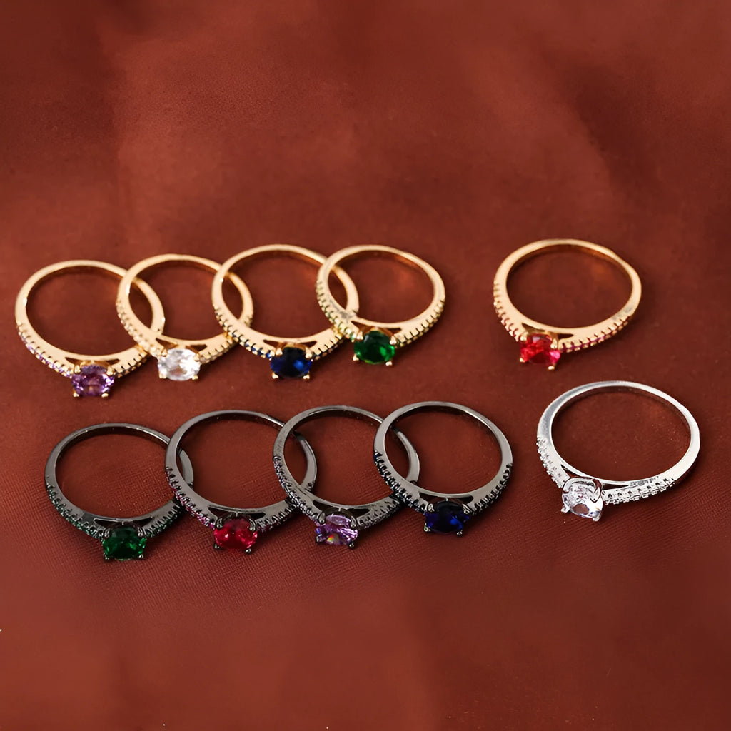 A hexagonal geometric zircon ring in a copper electroplated finish, showing one of the ten available colour options.