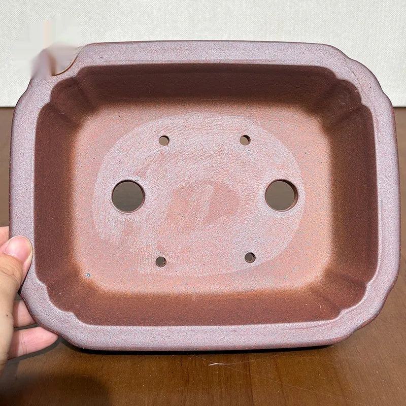 Rectangular stoneware flower pot in reddish brown with hand-glazed finish and 17cm base, for bonsai or firewood display.