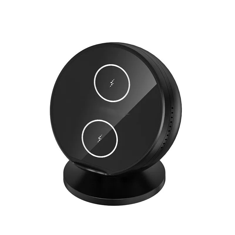 Black multifunctional wireless charging phone holder with integrated Bluetooth speaker on a desk