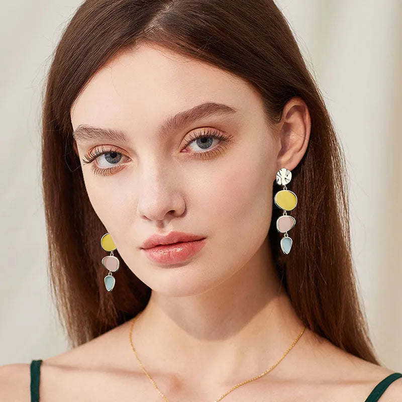 Morandi three-colour oil drip treated alloy disc stud earrings on Sterling silver posts.