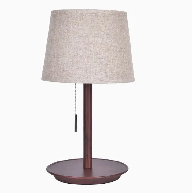 Walnut colour solid wood bedside lamp with white cloth shade and cable switch