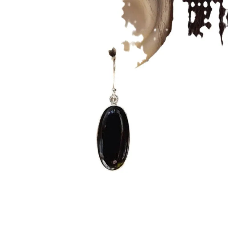 Women's black agate oval pendant earrings with geometric Chinese style framework and 925 silver electroplated finish