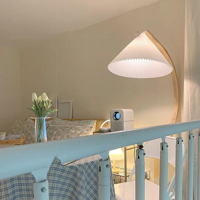 Vertical wooden table lamp with retro design in log white finish showing three colour light settings