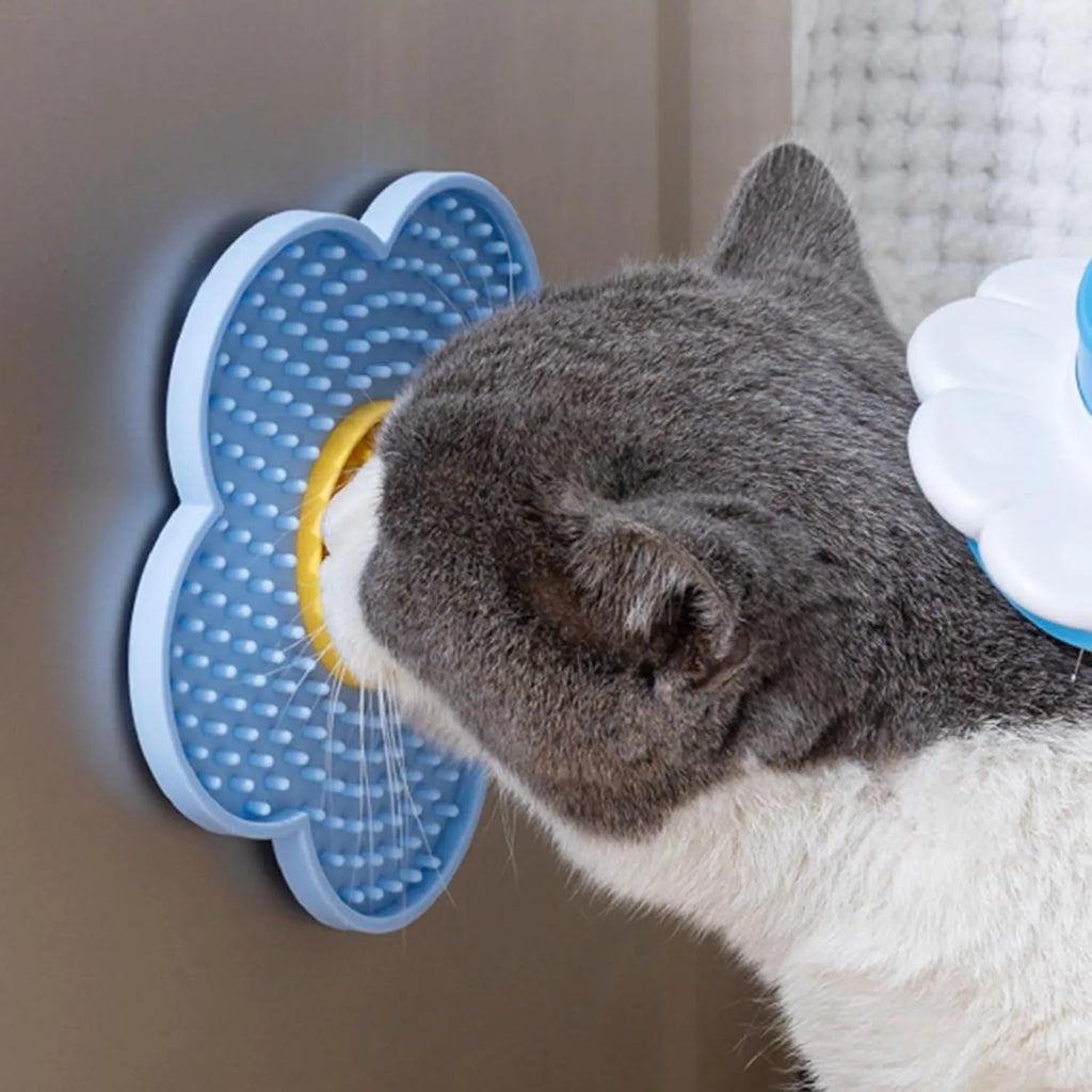 Flower-shaped silicone lick mat for dogs and cats with suction cups on the back, in assorted colours.