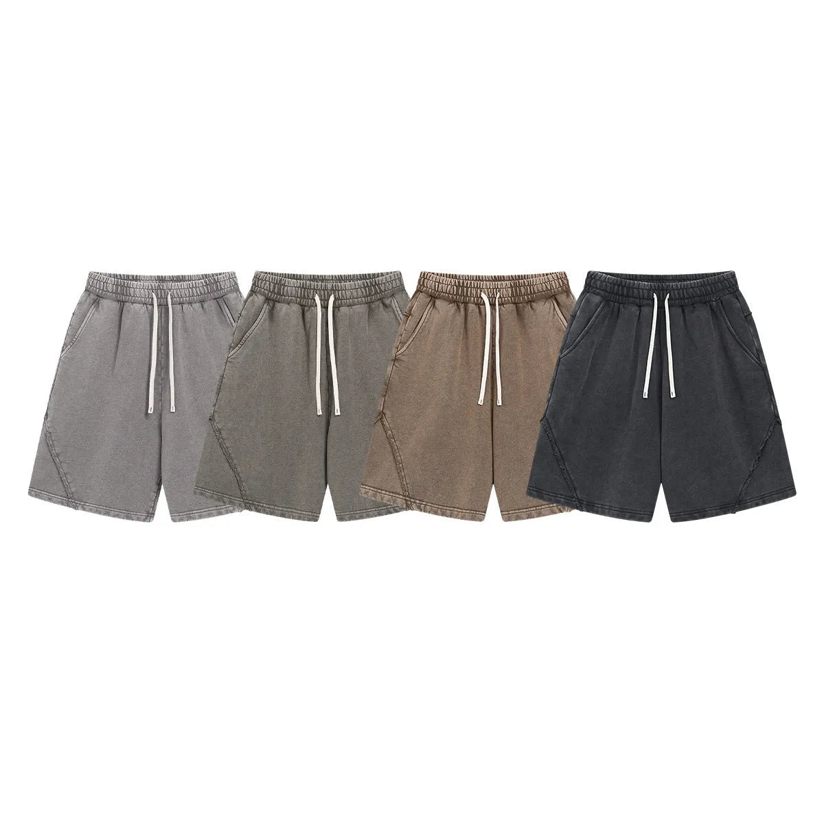 Men's loose-fit cotton terry shorts in batik colours on a size chart background.