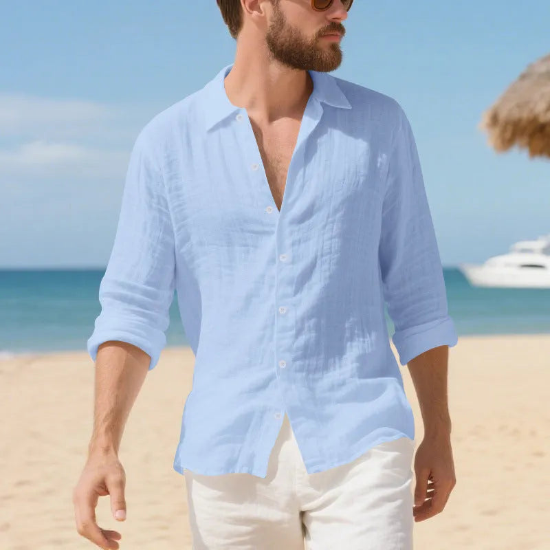 Man wearing a loose-fit linen casual shirt in a light colour, showcasing the non-iron style.