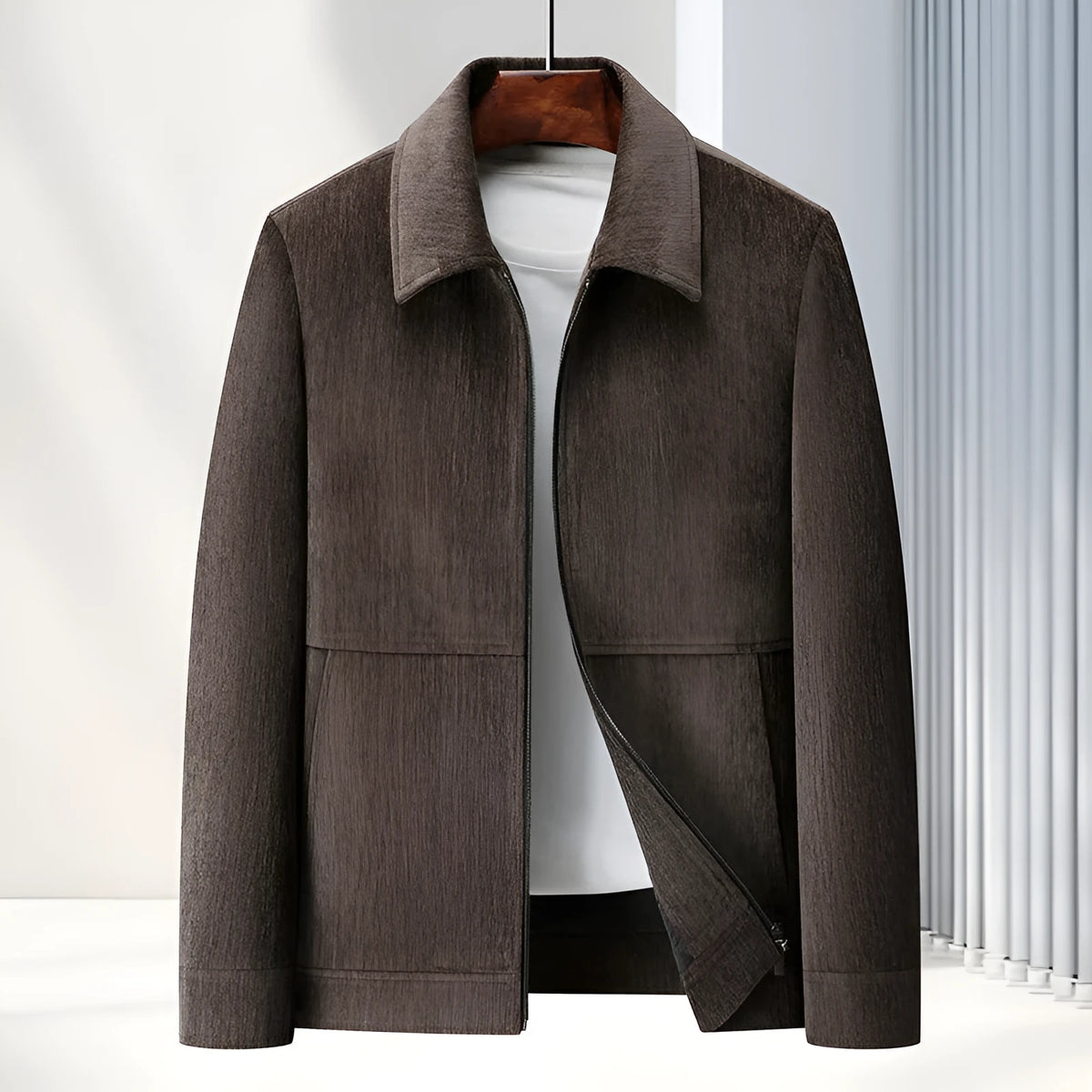 Men's slim fit casual coat with lapel collar in dark blue colour on a hanger.