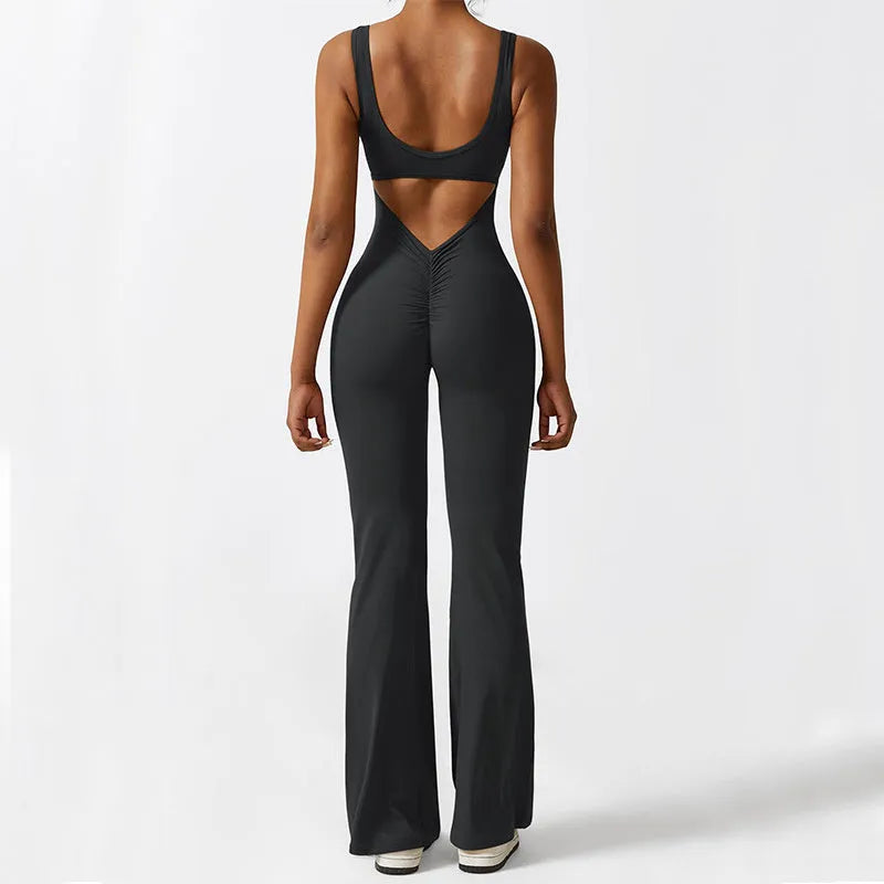 Women's sleeveless black flare jumpsuit long pants for yoga and fitness.