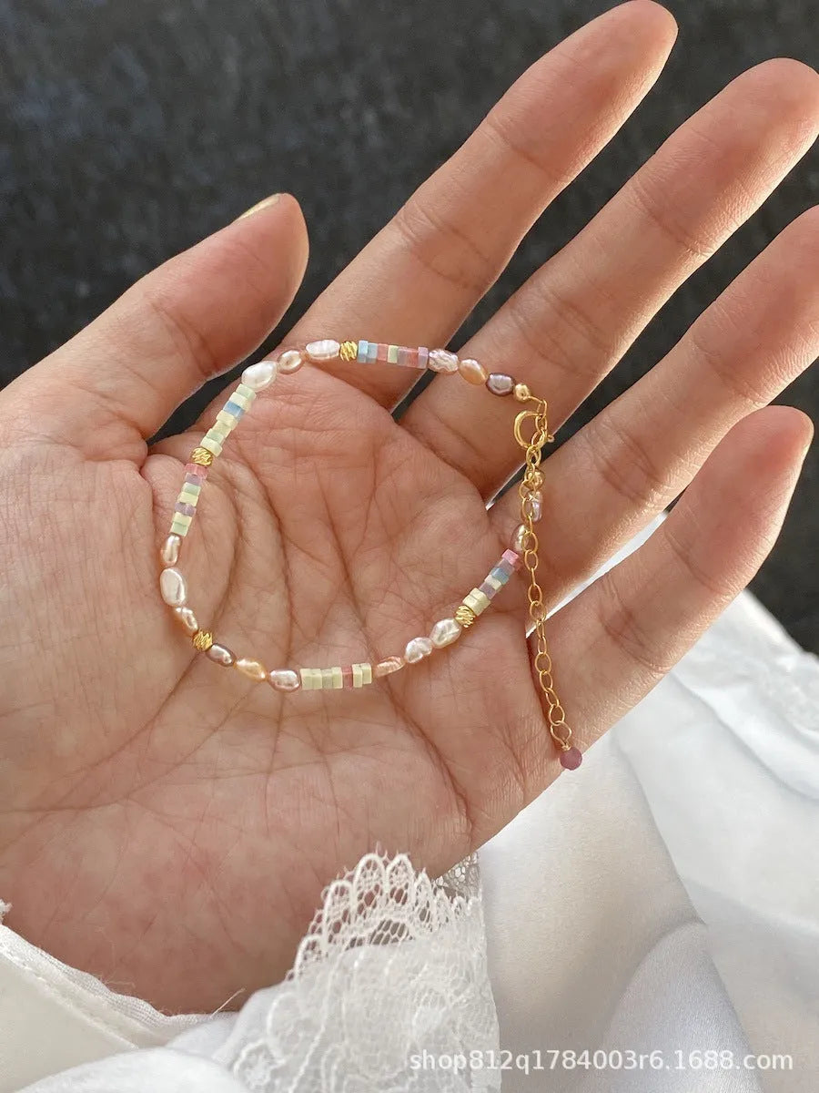 Women's natural pearl bracelet and necklace set with 14K gold gilded purple silver accents in U-shaped design