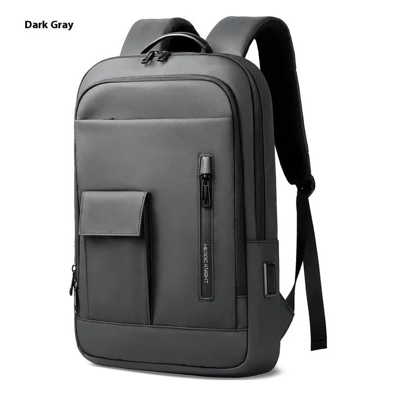 Men's solid colour Oxford cloth backpack in lightweight design for business travel.