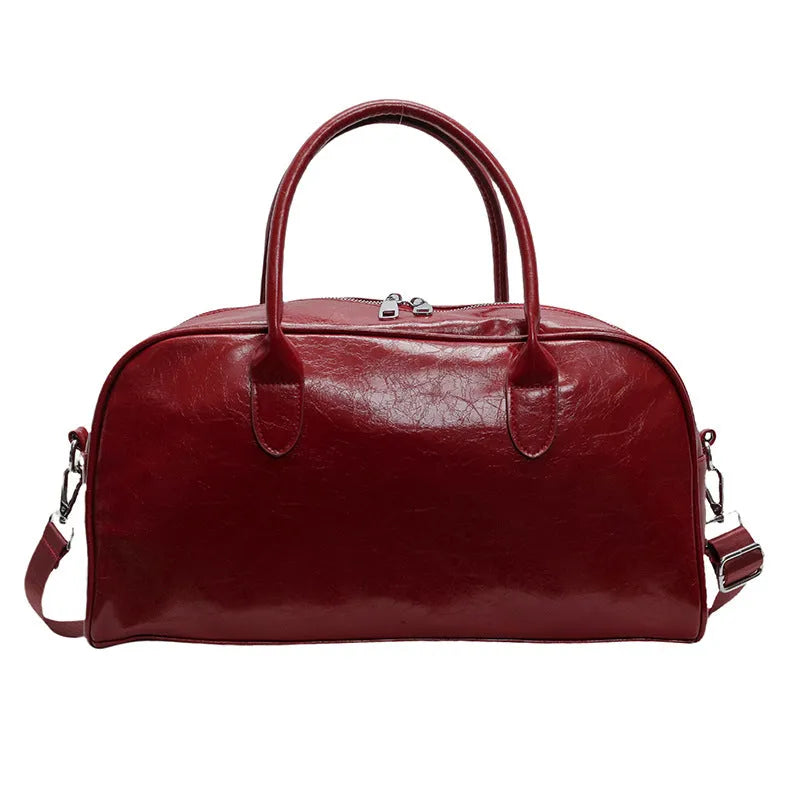 Women's lightweight PU leather travel bag with 20-35L capacity, dry wet separation, and wine red, black, or beige colour options