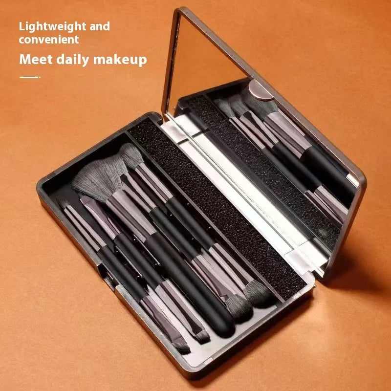 Makeup brush set with mirror in a case, showing silver and gold plastic handle options.