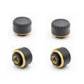 Four black wireless tyre pressure monitors with Bluetooth connectivity for car tyre pressure monitoring via mobile app
