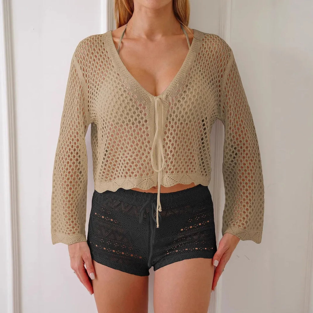 Women's apricot hollow woven cardigan blouse with bell sleeves shown open as a layer