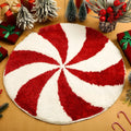 Printed round Christmas carpet on floor in red and green festive design.
