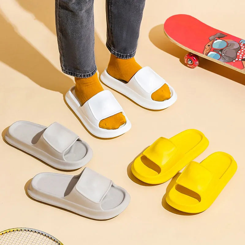 Unisex thick-soled EVA flip-flop slippers in various colours on a white background.