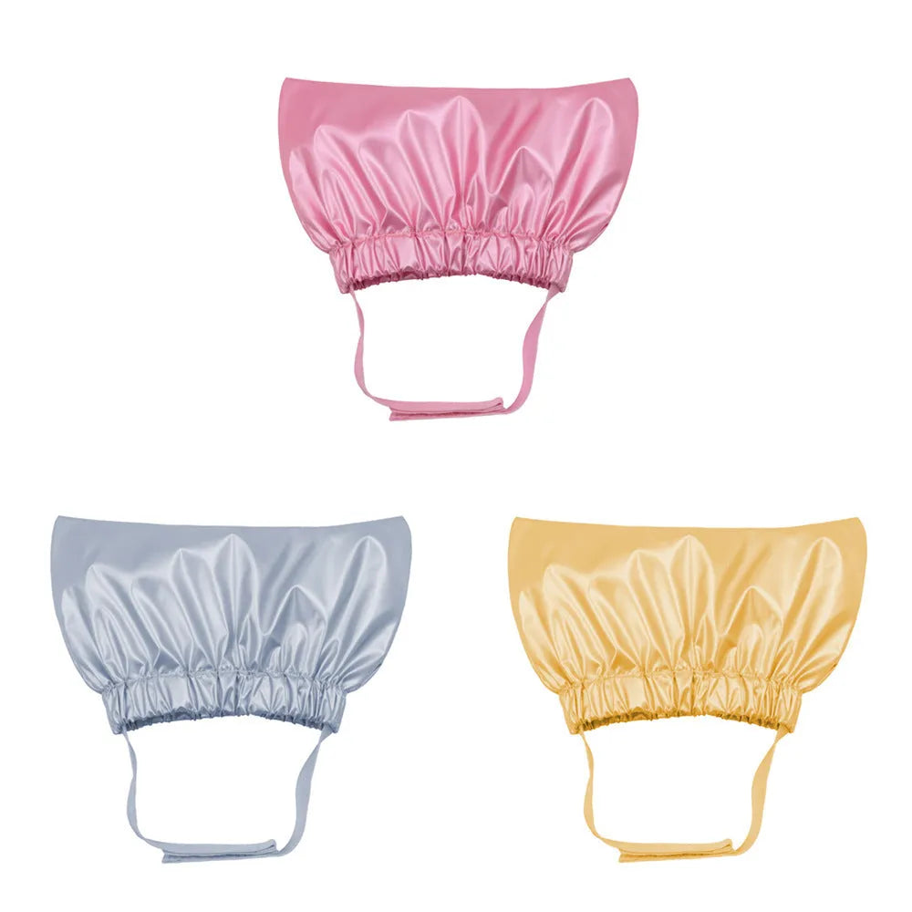 Adjustable waterproof shower cap for a cat or dog in gold, pink, or silver colour.