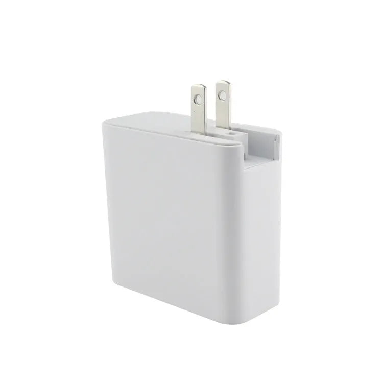 Four-port USB-C wall charger with LED light in black or white colours showing UK, EU, US and AU plug variants