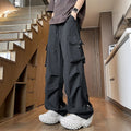 Plus size women's waterproof straight leg trousers in black, white or grey colours