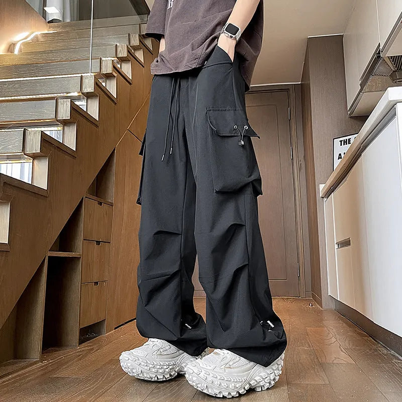 Plus size women's waterproof straight leg trousers in black, white or grey colours