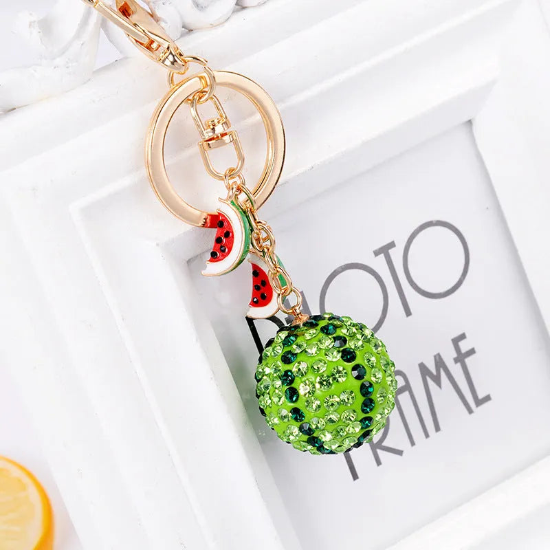 Green zinc alloy watermelon-shaped keychain measuring 12cm with metal keyring