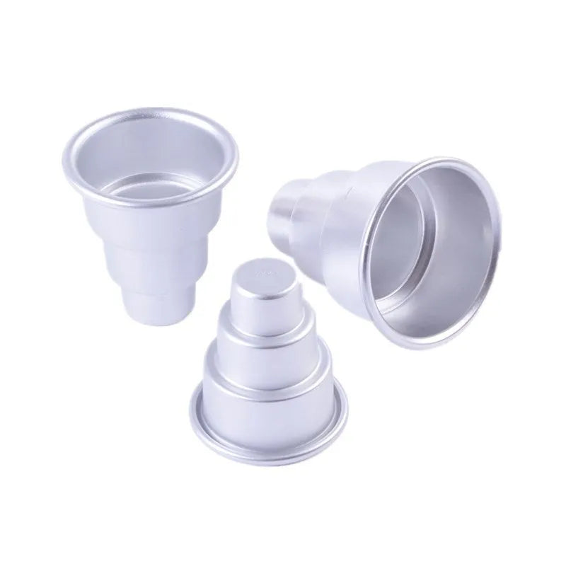 Set of three silver aluminium alloy cake moulds in large, medium, and small sizes for baking.
