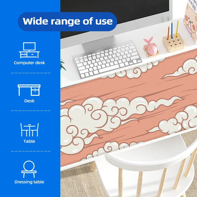 Large Japanese-style cloud pattern desk mat with non-slip rubber base on a wooden desk.
