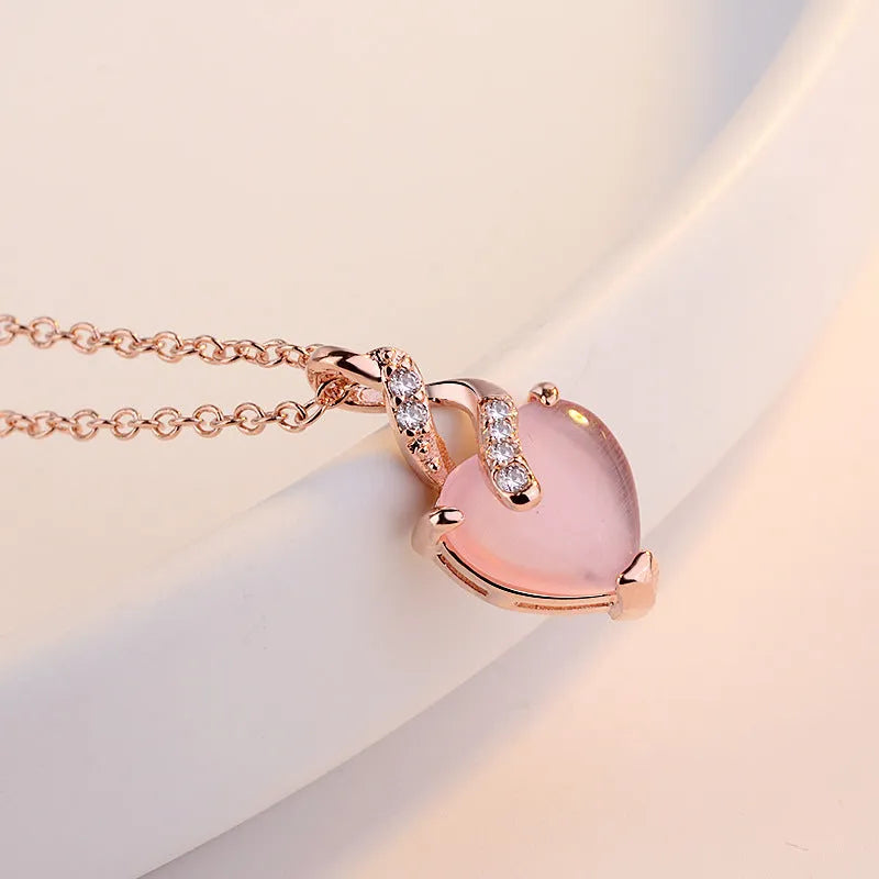 Women's heart-shaped pink crystal pendant necklace on rose gold electroplated chain