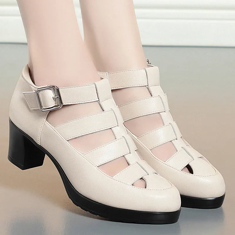 Women's beige closed toe sandals with chunky heel, woven pattern, and ankle-strap buckle