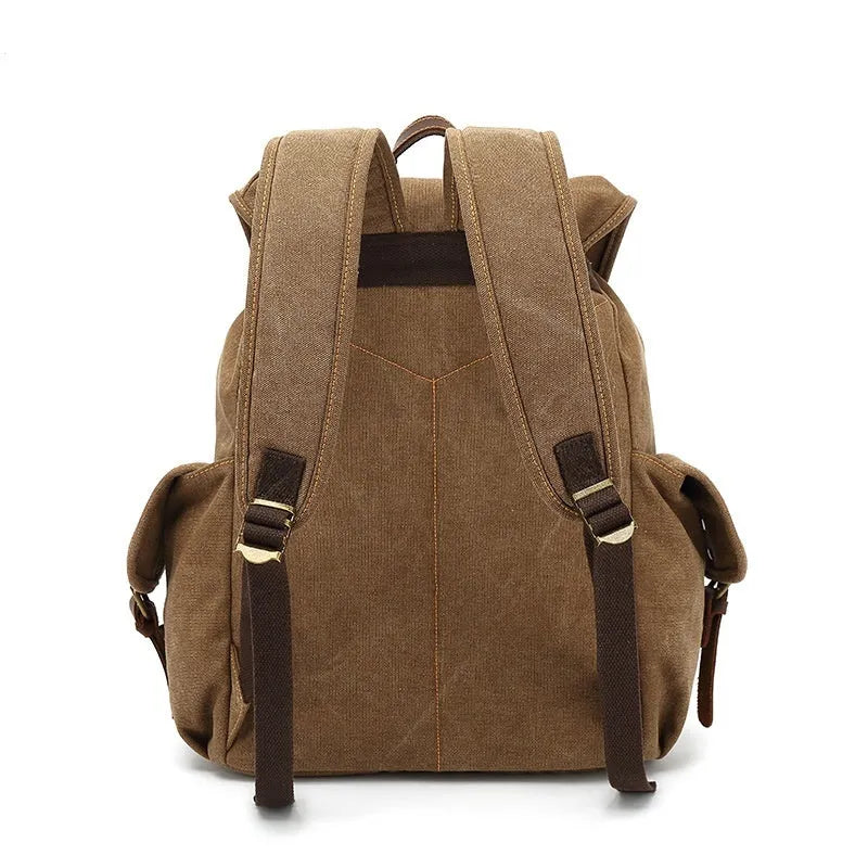 Retro polyester cotton canvas backpack in military green with antique bronze hardware, showing front and side view.